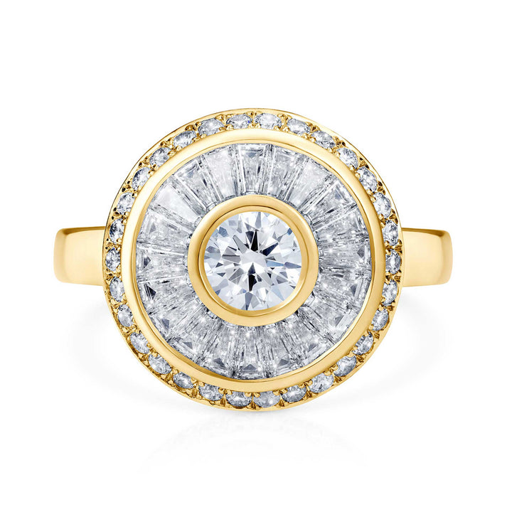 Sarah May Jewellery Happy Pod ring in yellow gold, shown from face on. Ring features a large centre diamond surrounded by a thin yellow gold circle, then a circular row of bagguet diamonds, another thin row of yellow gold and then a final circular band of smaller diamonds.