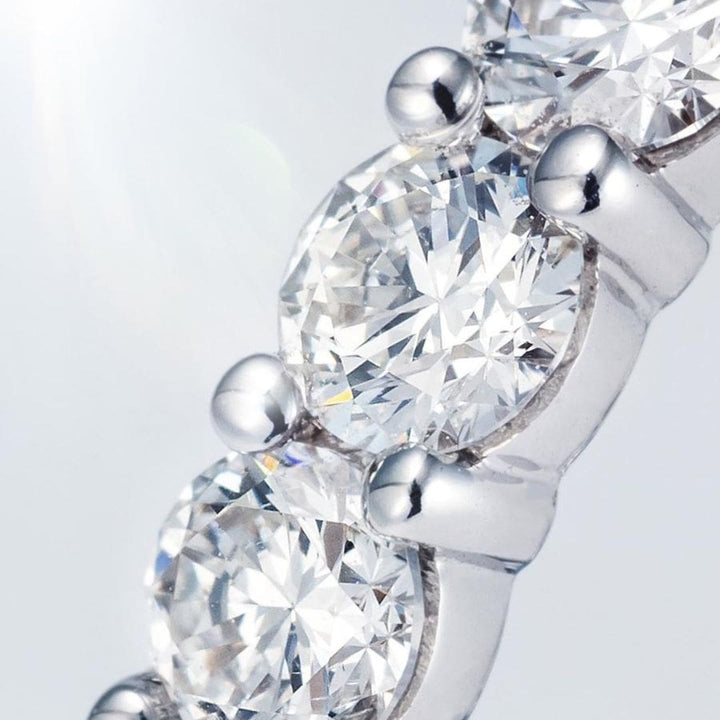 Beautiful close up of the Sarah May Jewellery Eternity Love Ring, showing the light bouncing around the diamonds.